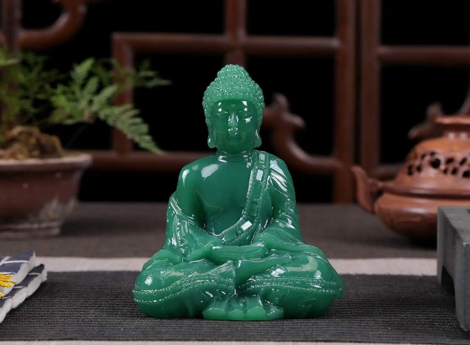 Faux jade Buddha statue
